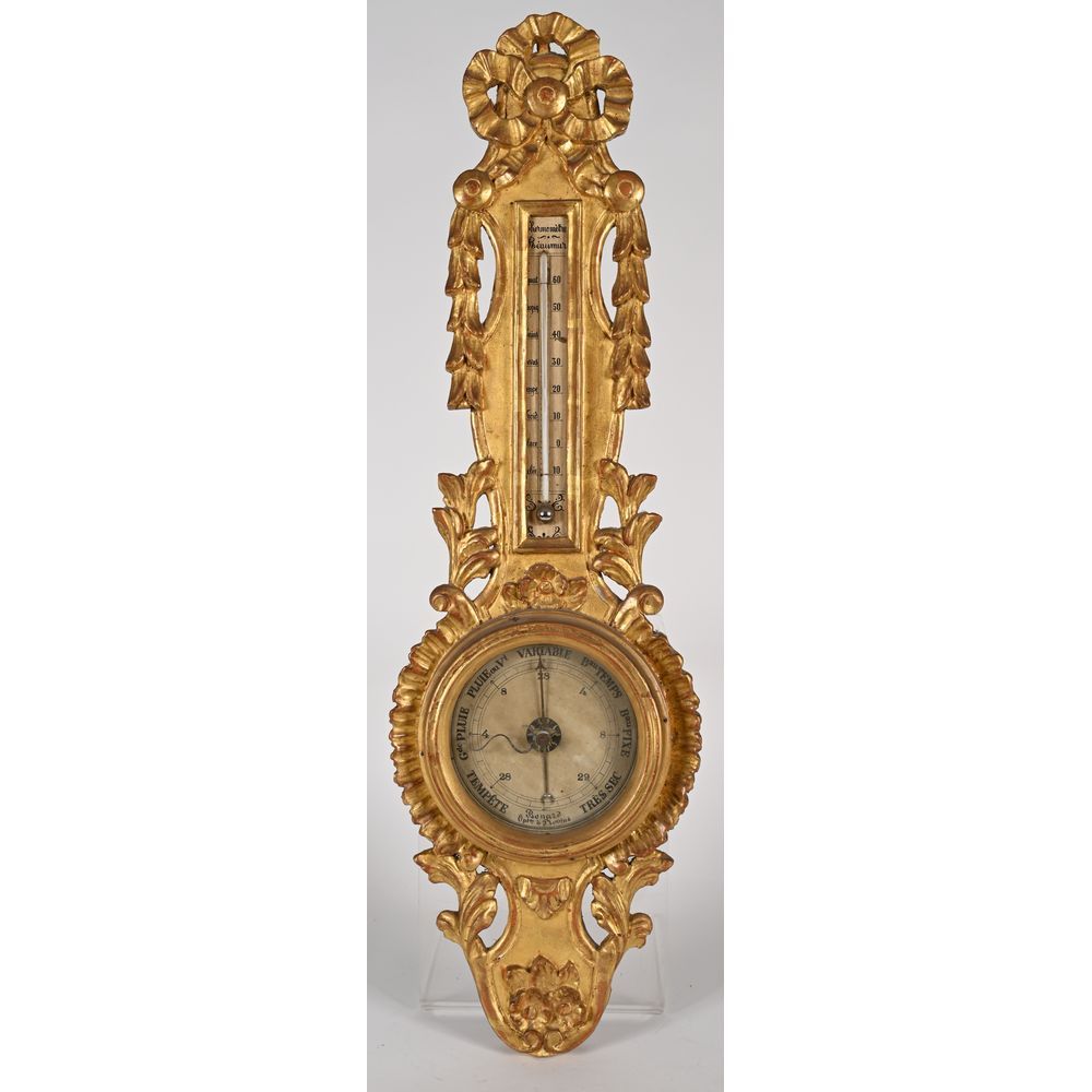 Null BAROMETRE-THERMOMETRE LOUIS XVI en bois doré à décor d’un nœud de ruban et &hellip;