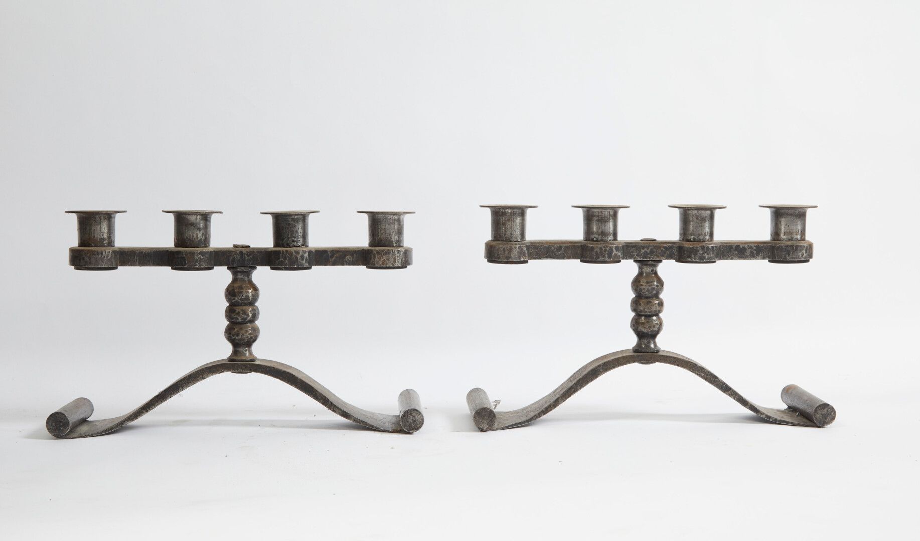 Null Pair of wrought iron candlesticks with 3 arms of lights.

20th century

Hei&hellip;