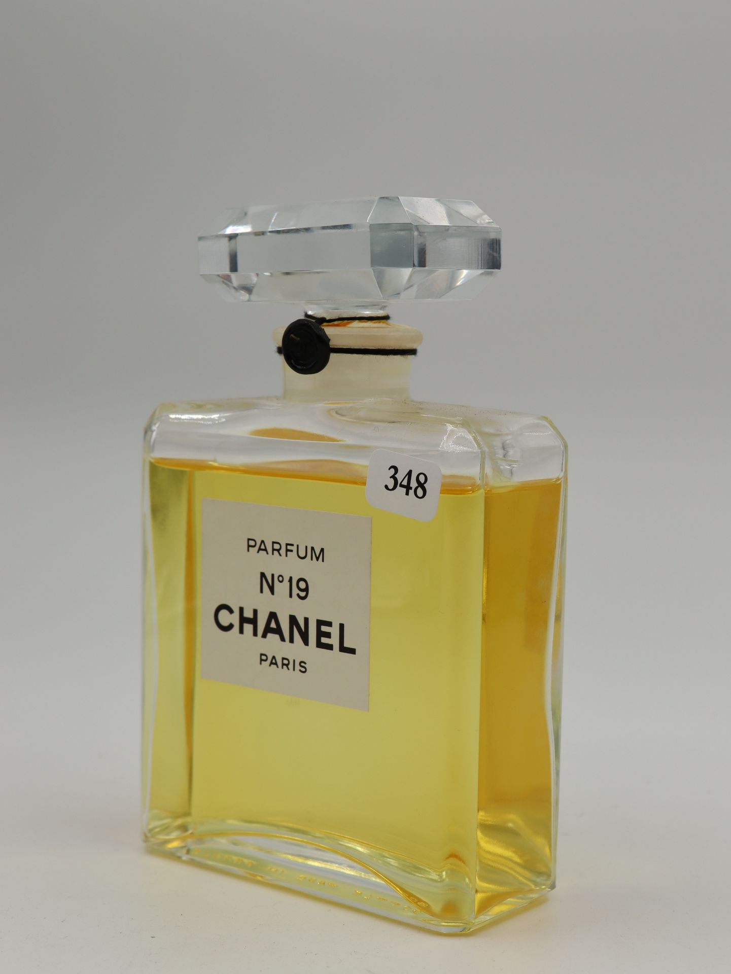 CHANEL n°19 - Dummy perfume bottle. H. 15 cm.