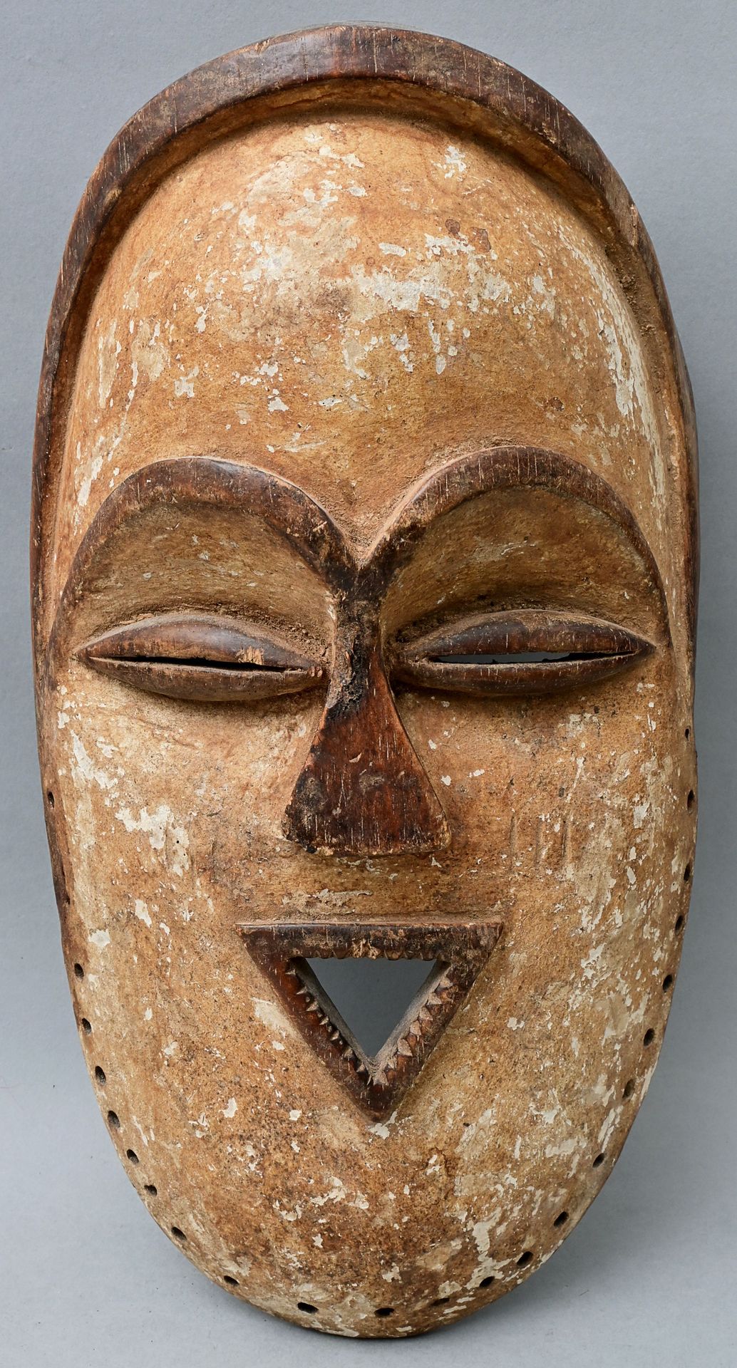 Null Mask, Gabon, Vuvi wood, carved, white color pigment. Typical triangular mou&hellip;