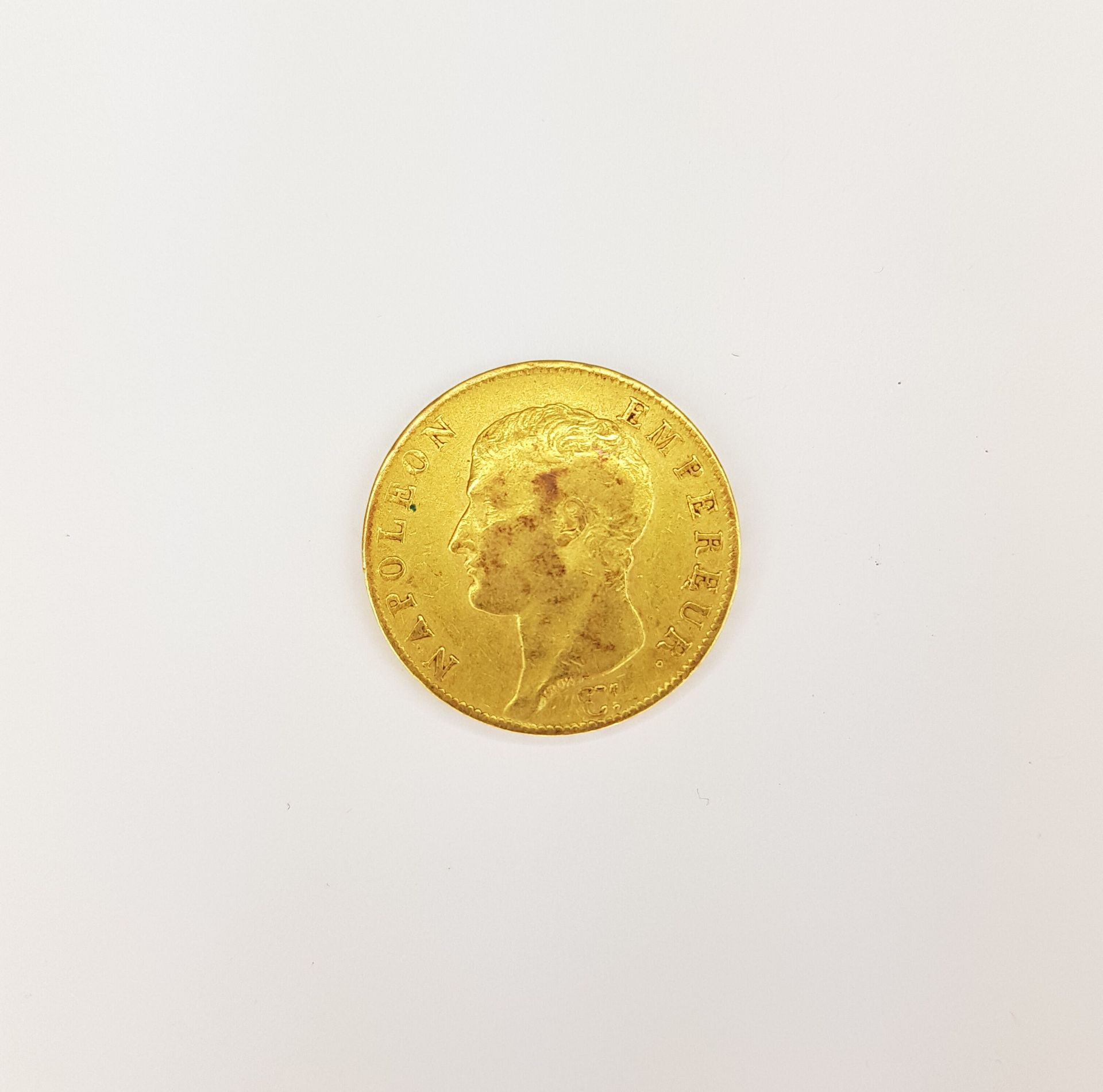 Null UNE pièce de 40 francs en or Napoléon Empereur, datée 1806