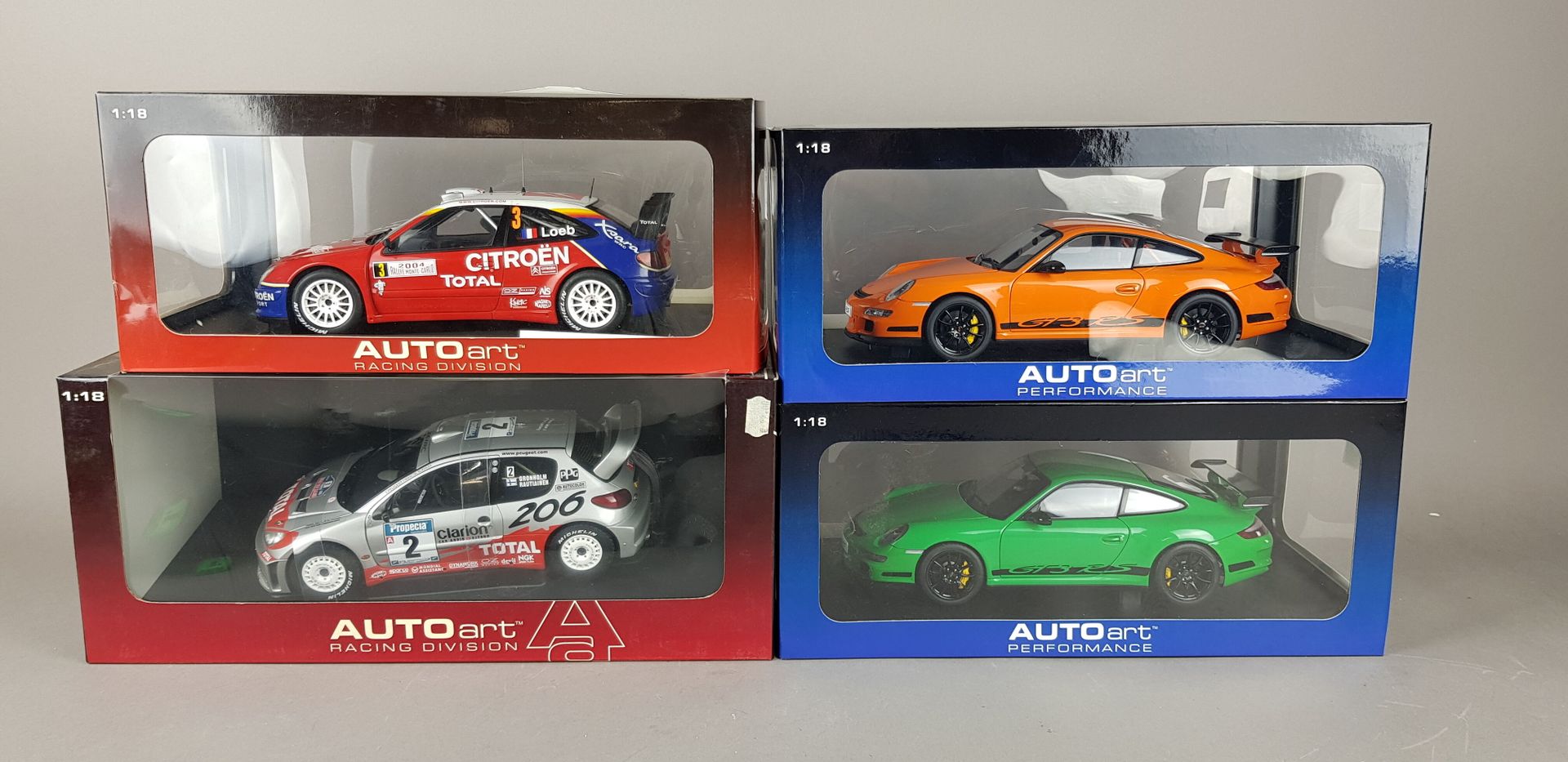 Null AUTO-ART性能 - 四辆1/18比例的汽车。

2辆保时捷997 GT3 RS（绿色和橙色

1x 雪铁龙XSARA WRC 2004

1x &hellip;