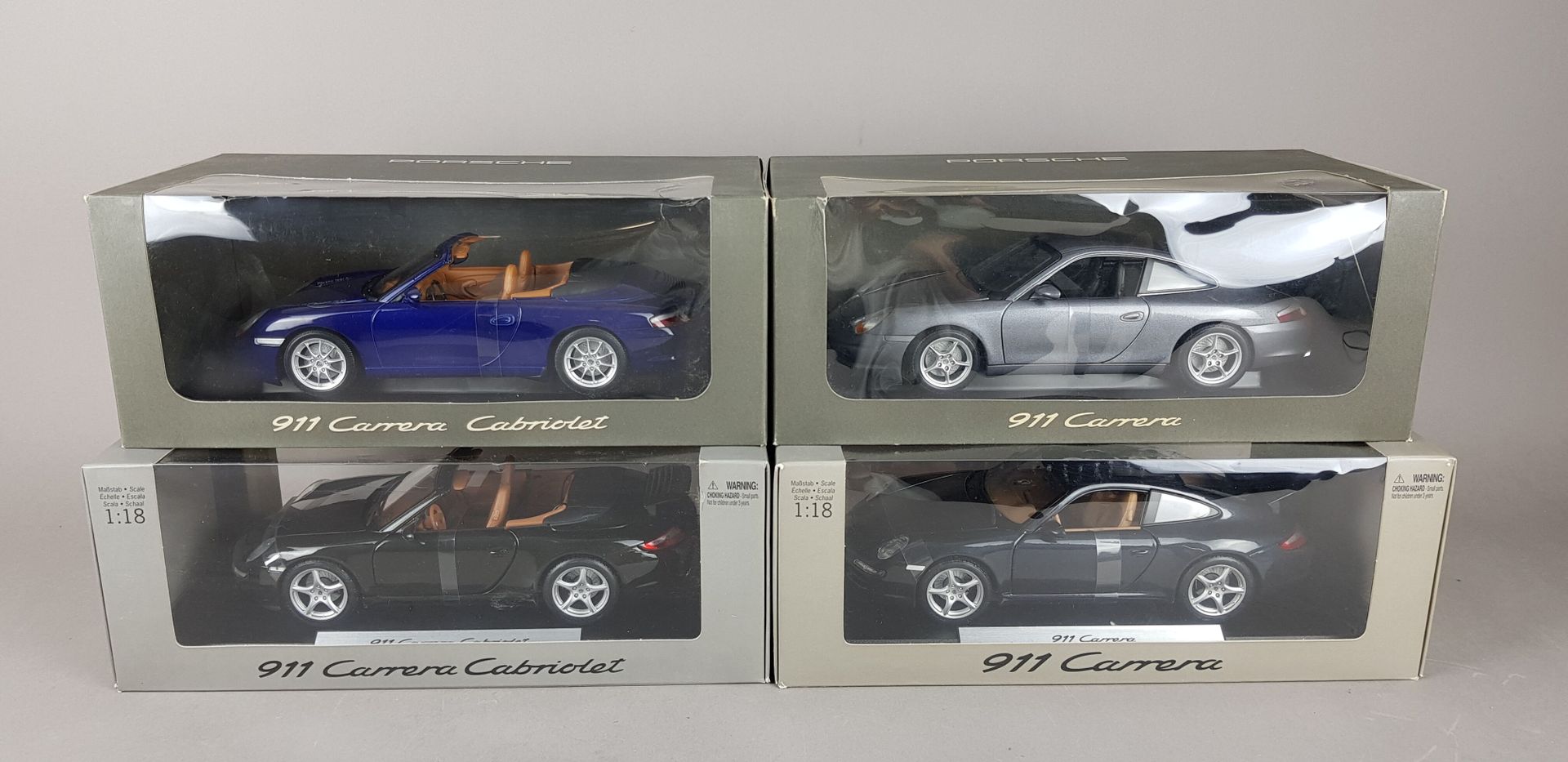 Null PORSCHE - QUATRE PORSCHE 911 échelle 1/18 :

2x Carrera cabriolets

2x Carr&hellip;