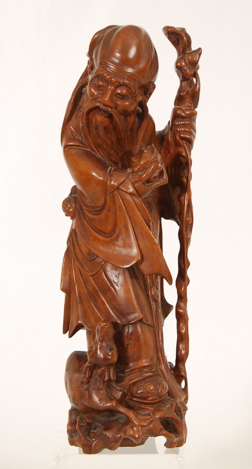 Null 有鹿的寿老
木雕。中国，19世纪末。
，高35厘米。
