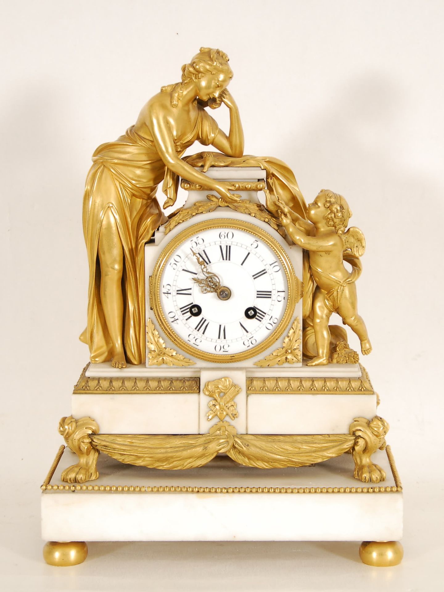 Null An ormoulu and marble mantel clock 
Representing 'le retour de l'amour" aft&hellip;