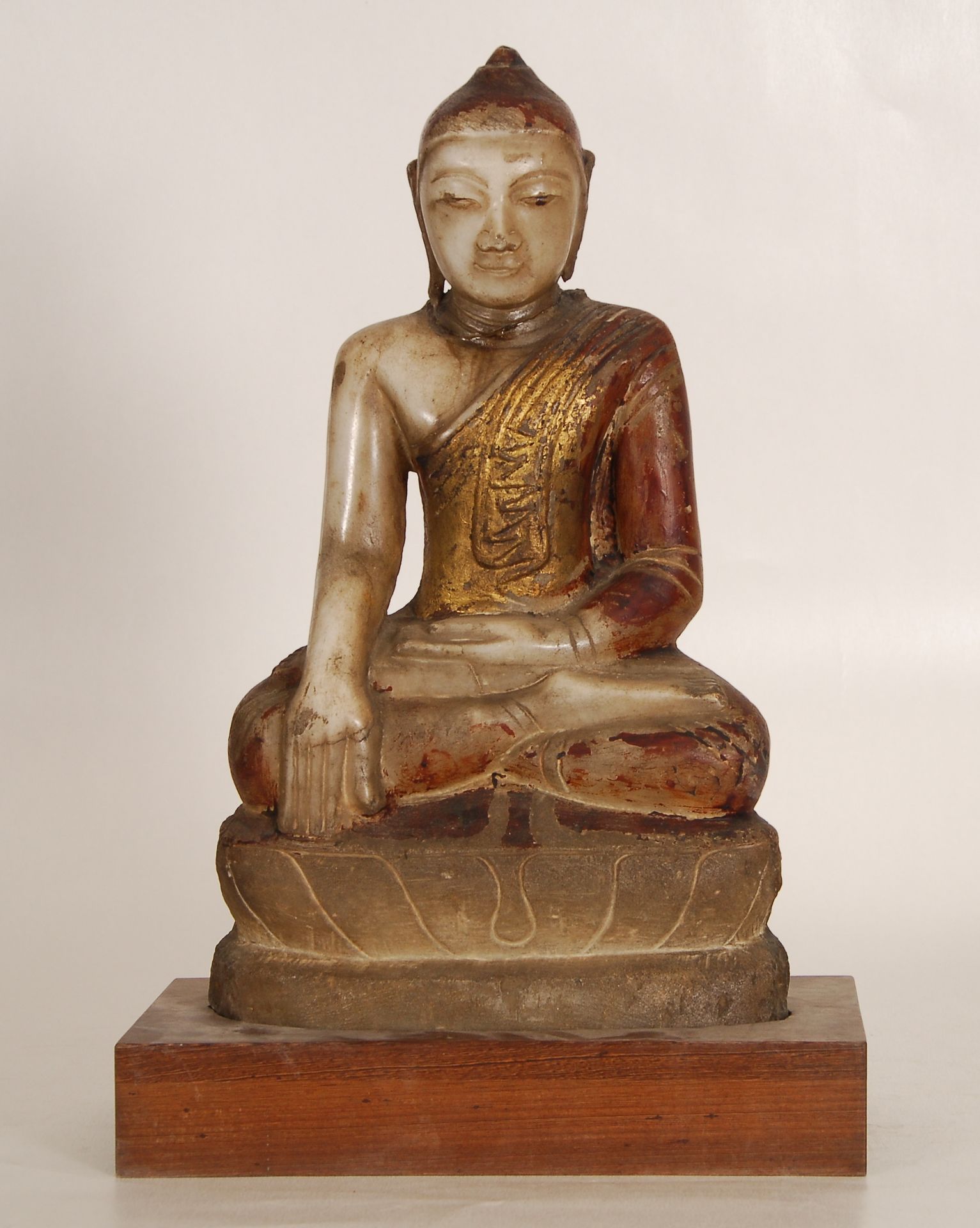 Null Seated Buddha 
Polychromed alabaster with gold highlights. China, 19th cent&hellip;