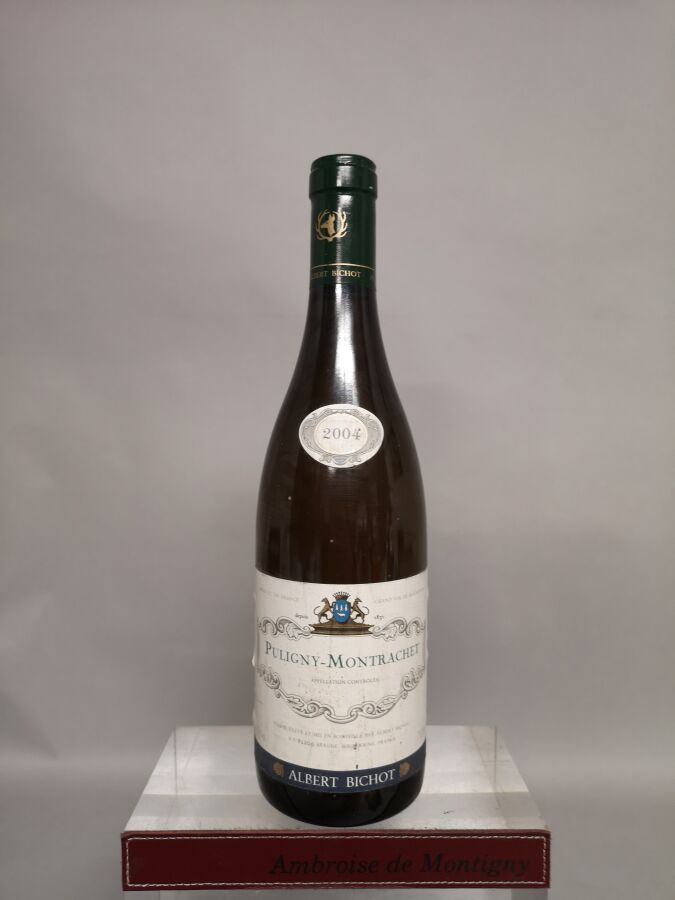 Null 1 Flasche PULIGNY-MONTRACHET - Albert BICHOT 2004.

Leicht fleckiges Etiket&hellip;