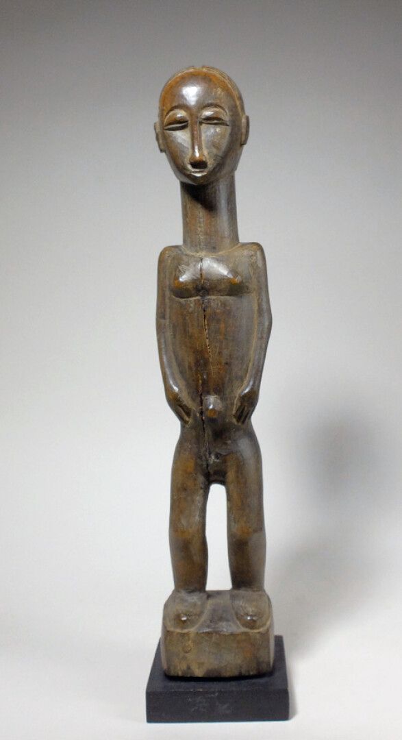 Null Statuette Baoulé (Côte d'Ivoire)

Personnage debout les bras le long du cor&hellip;