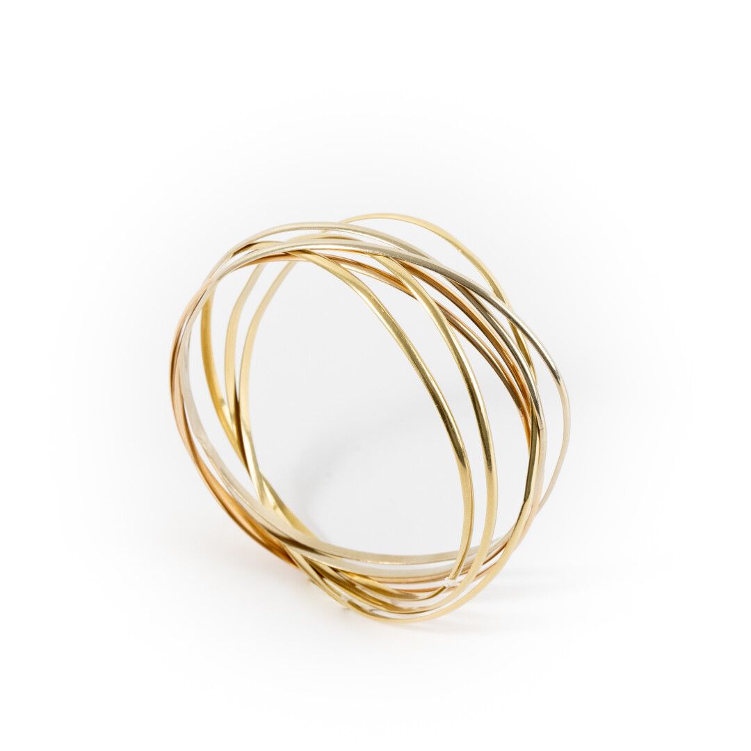 Null Three gold semainier bracelet

 Weight : 40.8 g- Diam : 6.5 cm- deformation&hellip;