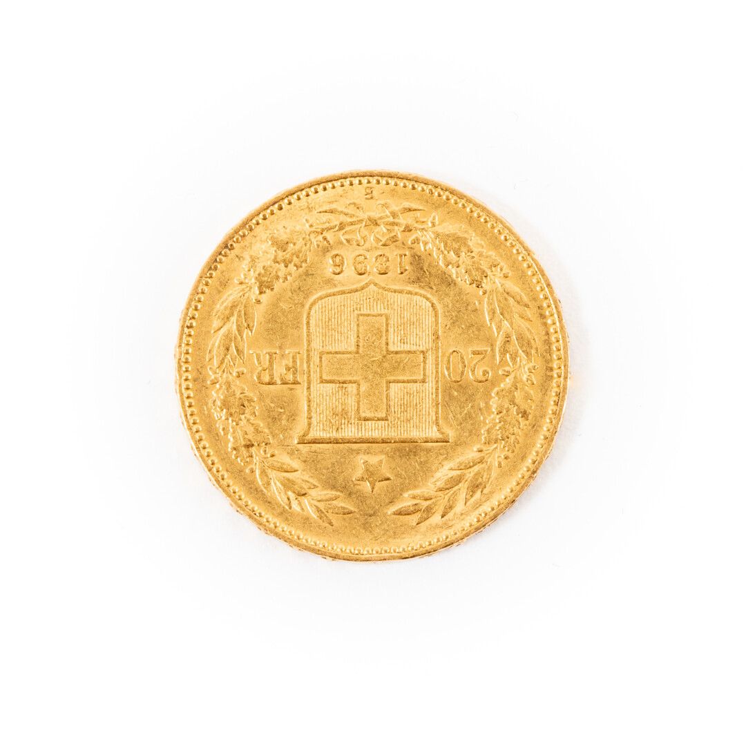 Null Eine goldene 20-Franken-Münze aus der Schweiz