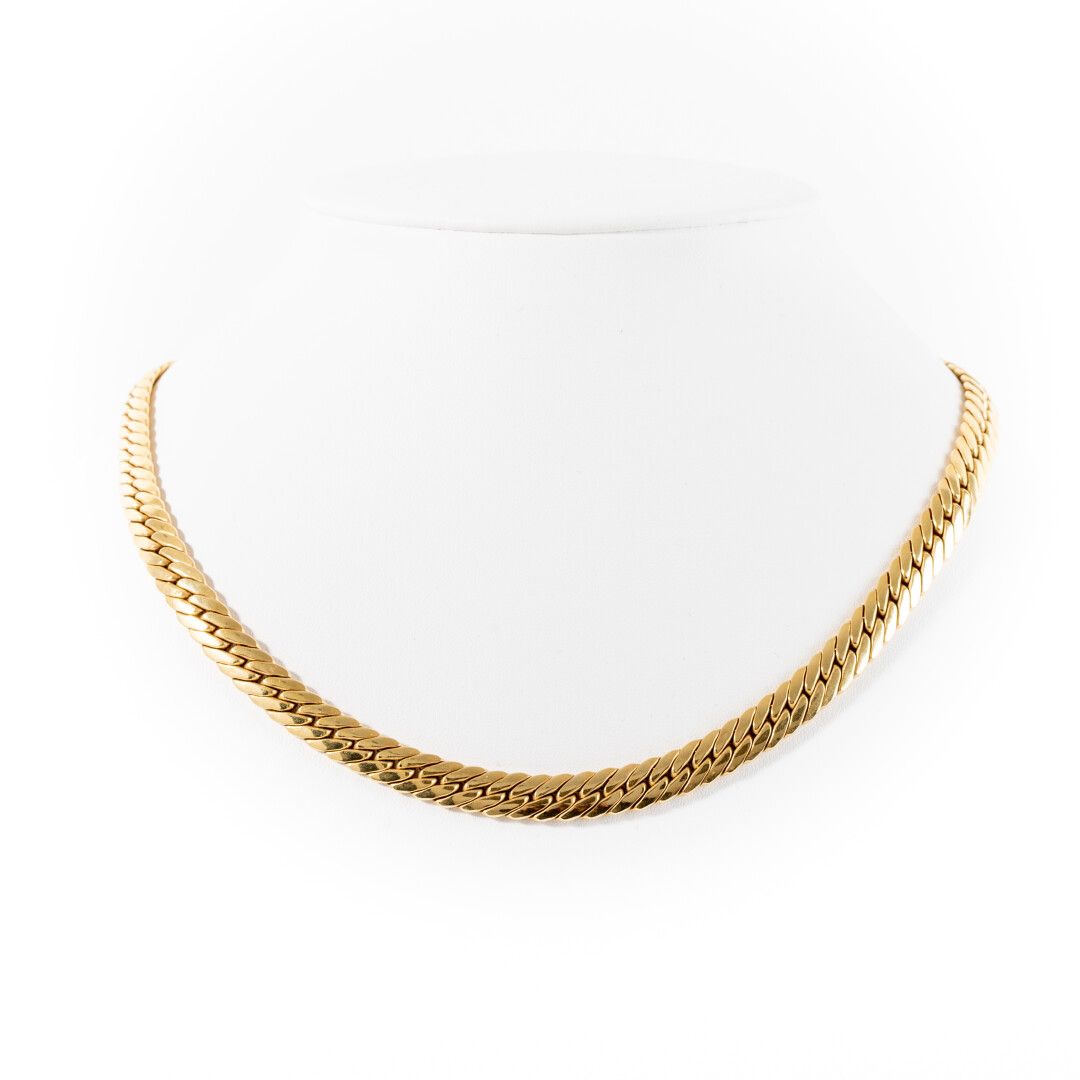 Null Halskette aus Gold mit "Schlangenmuster". 

Gewicht: 33g - L: 43 cm