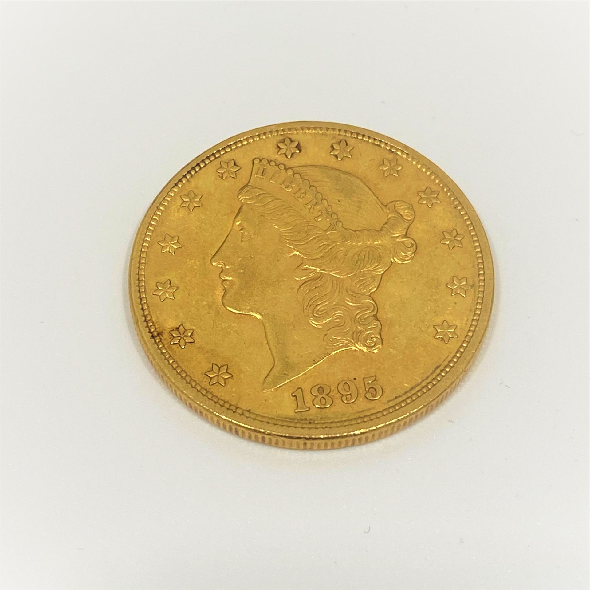 Null 
Pièce de 20 dollars en or 1895