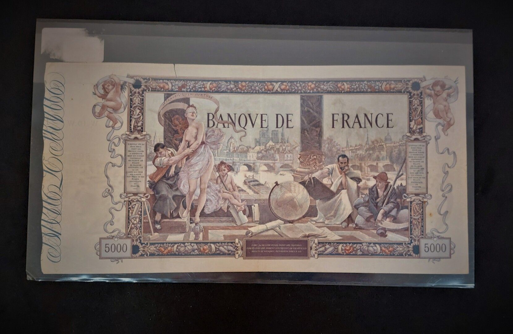 Null Eine 5000 Fr Flameng-Note vom 12. Januar 1918. 

Ein kleiner Riss sonst TTB
