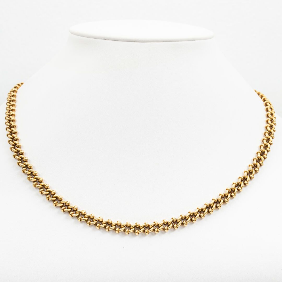 Null Halskette aus Gold, Phantasiegeflecht. 

Gewicht: 29.3 g - L: 50