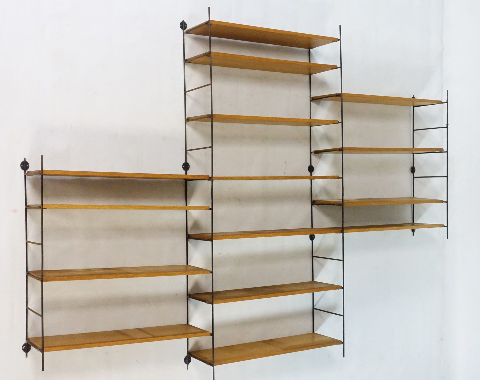 Null 
In the style of STRING & TOMADO shelves. Wall shelf with fifteen shelves i&hellip;