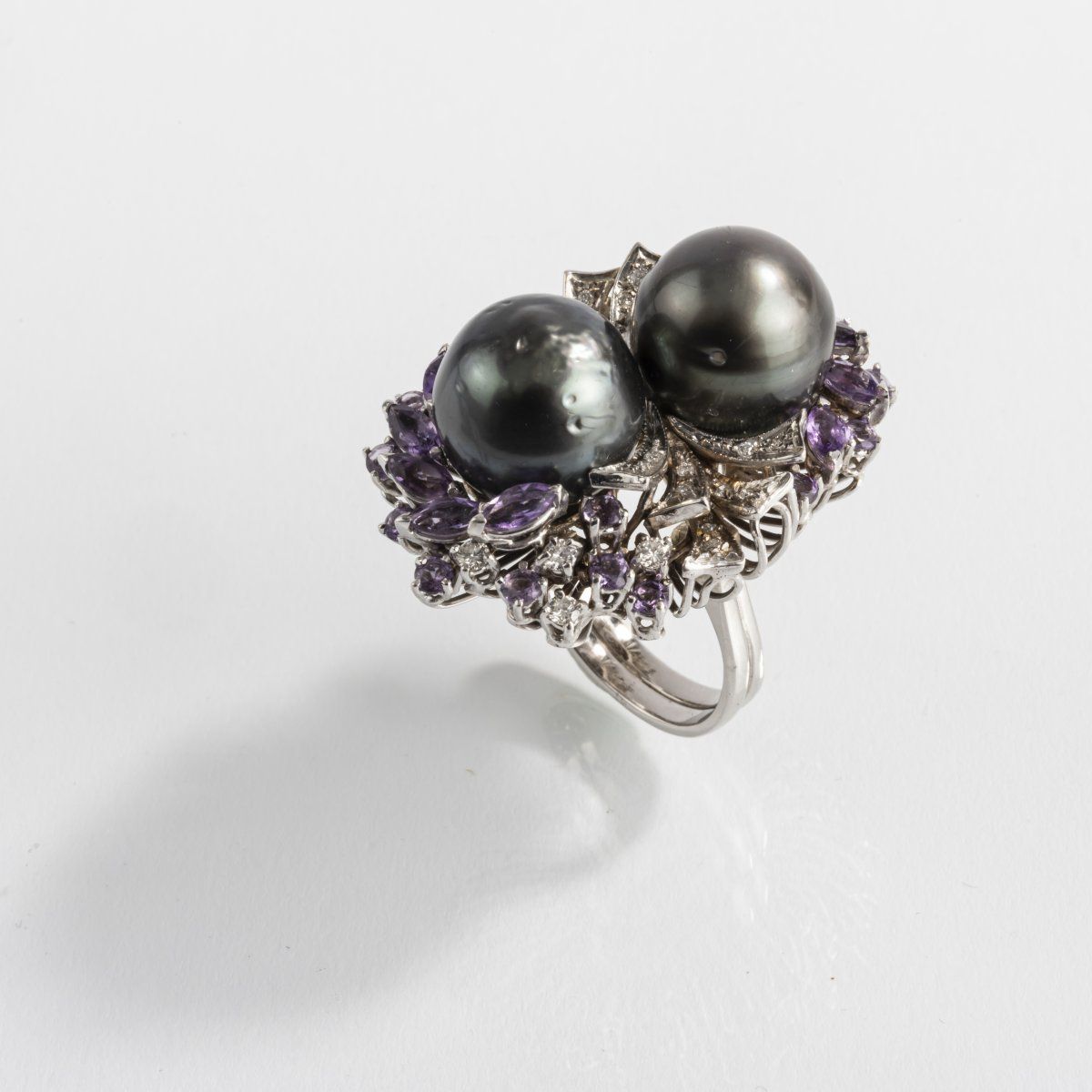 Null Germany, Cocktail ring, 1960s, 18ct. White gold, diamonds, amethysts, black&hellip;
