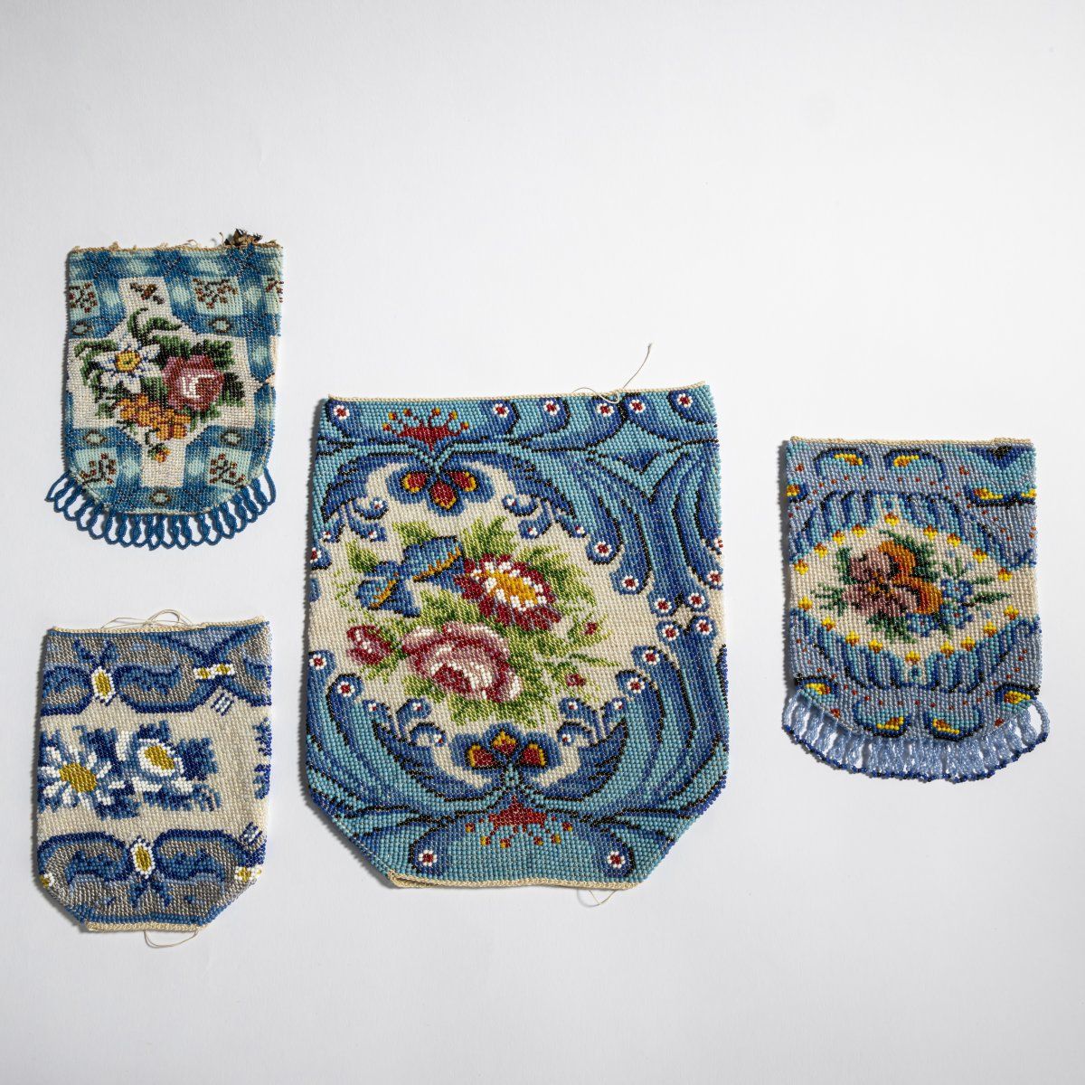 Null Four plates for bags, c. 1900, H. 22 x 19 cm; H. 15 x 11.5 cm; H. 15.5 x 12&hellip;