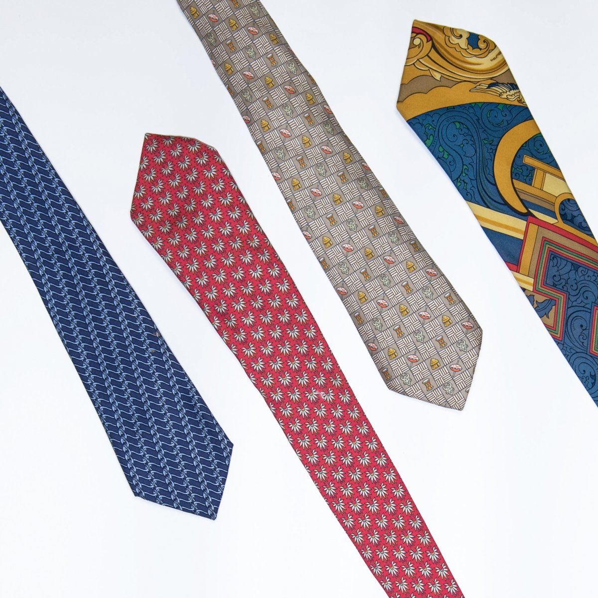 Null Hermès, Paris, Four ties with different motifs, Silk, polychrome printed, s&hellip;