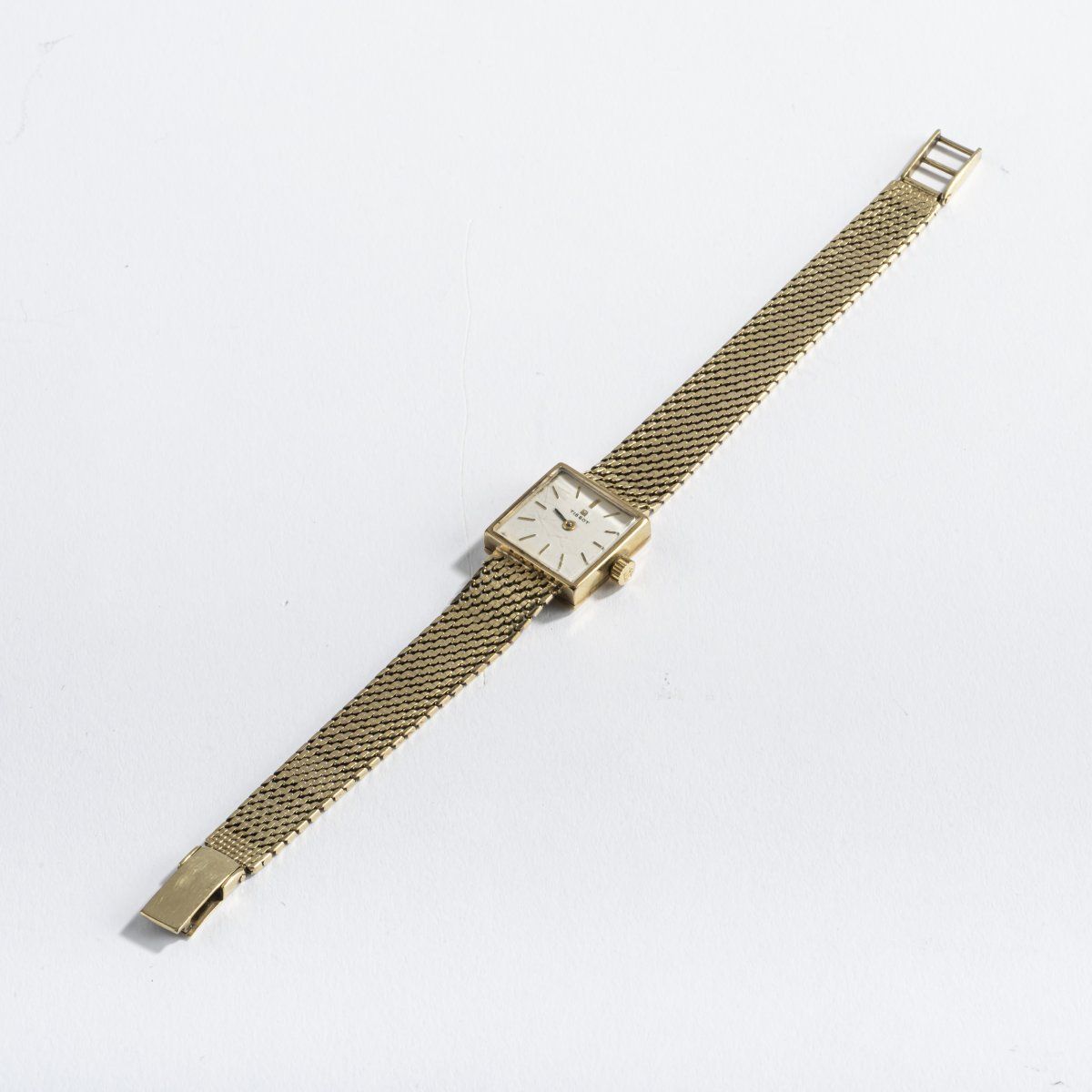 Null Tissot S. A., Le Locle, 女士腕表，1950年代，14ct.黄金，玻璃下白色表盘。重29.49克。长（打开）170毫米。

有签&hellip;