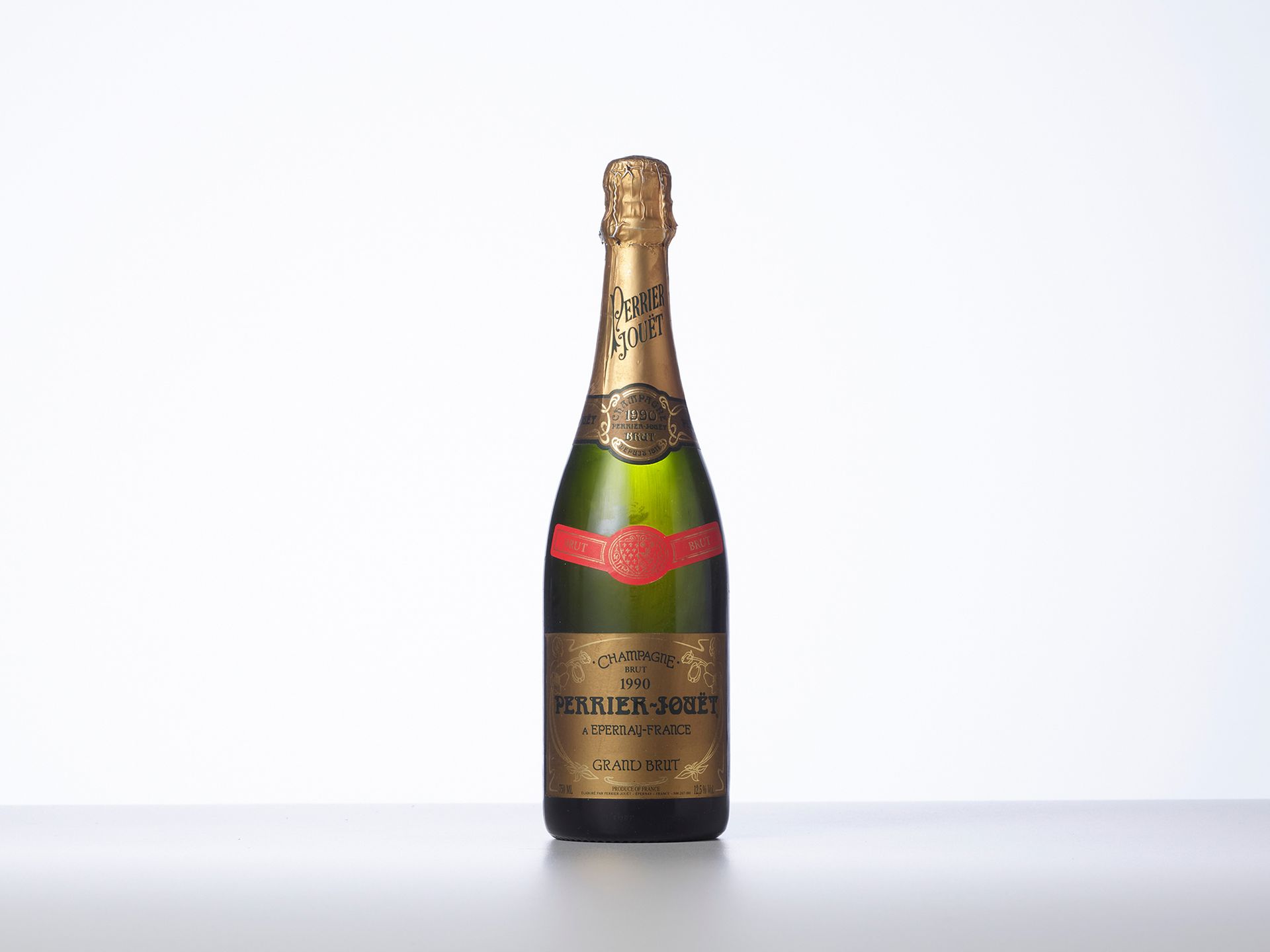 Null 1 Bottle CHAMPAGNE "GRAND BRUT 

Year : 1990 

Appellation : Perrier-Jouët &hellip;
