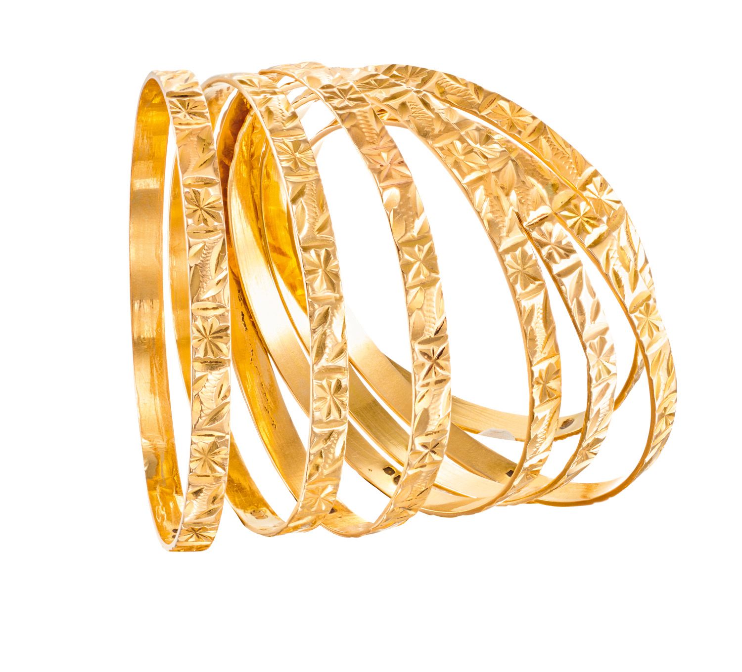 Semainier en or jaune retenant 7 bracelets ciselés

Ø : 6 cm

Pb : 98,6 g (18K-7&hellip;
