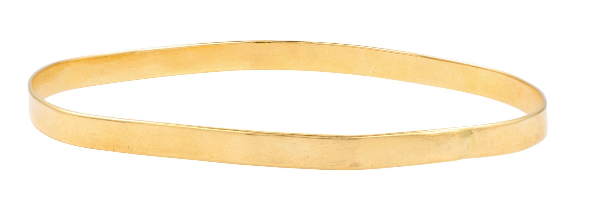 Bracelet Armreif aus Gelbgold (verformt).
Ø: ca. 6 cm.
KG: 7,85 g (18K-750/1000)