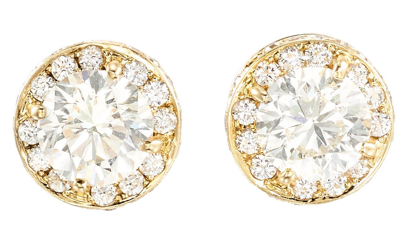 Boucles d'oreilles "Soleil" en or jaune, chacune centrée d'un diamant taille bri&hellip;