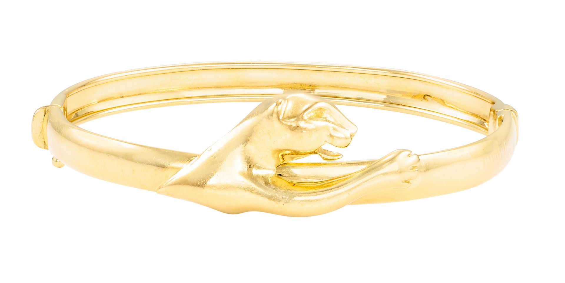 Bracelet "Panthère" en or jaune à ouverture latérale
Ø : 5,7 cm 
Pb : 15,10 g (1&hellip;