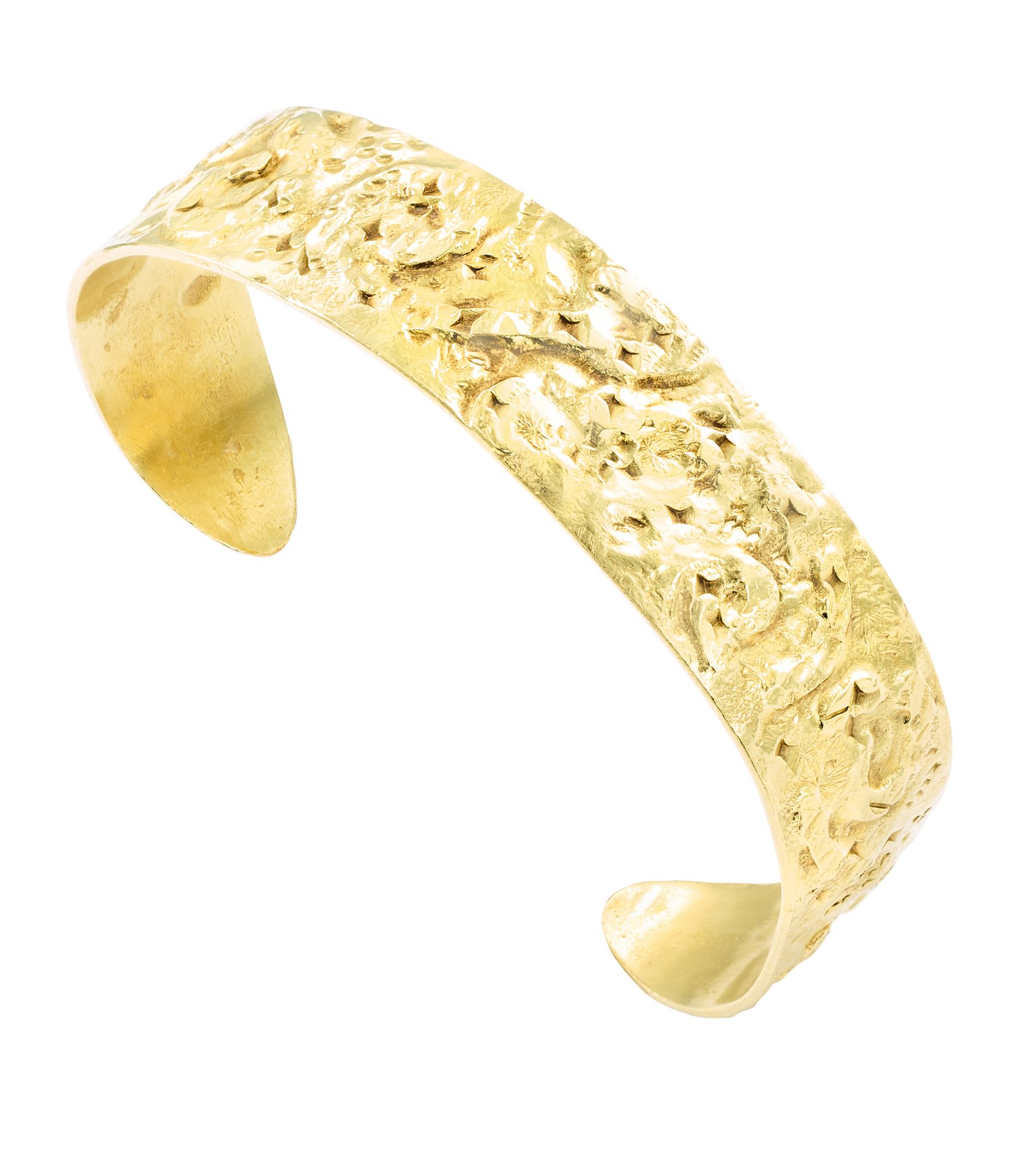 Bracelet jonc rigide semi-ouvert en or jaune texturé
l : 1,6 cm 
Pb : 41,41 g (1&hellip;
