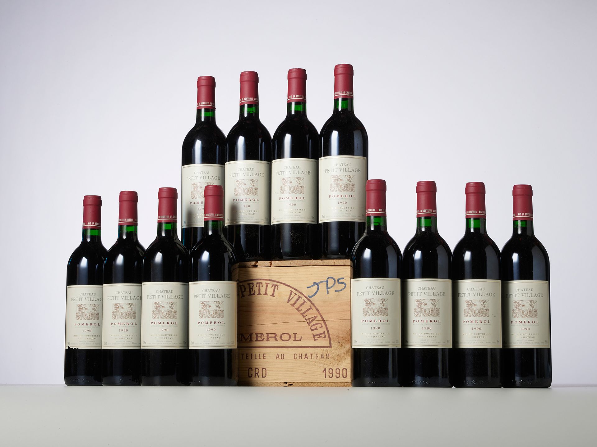 Null 12 Bottles CHÂTEAU PETIT VILLAGE 
Year : 1990 
Appellation : Pomerol 
Packa&hellip;