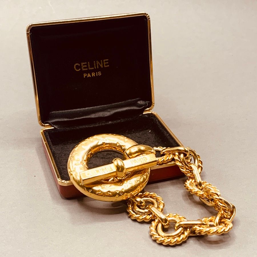 Null 
CELINE

Gold-plated metal bracelet, imitation rope stitches, toggle clasp &hellip;