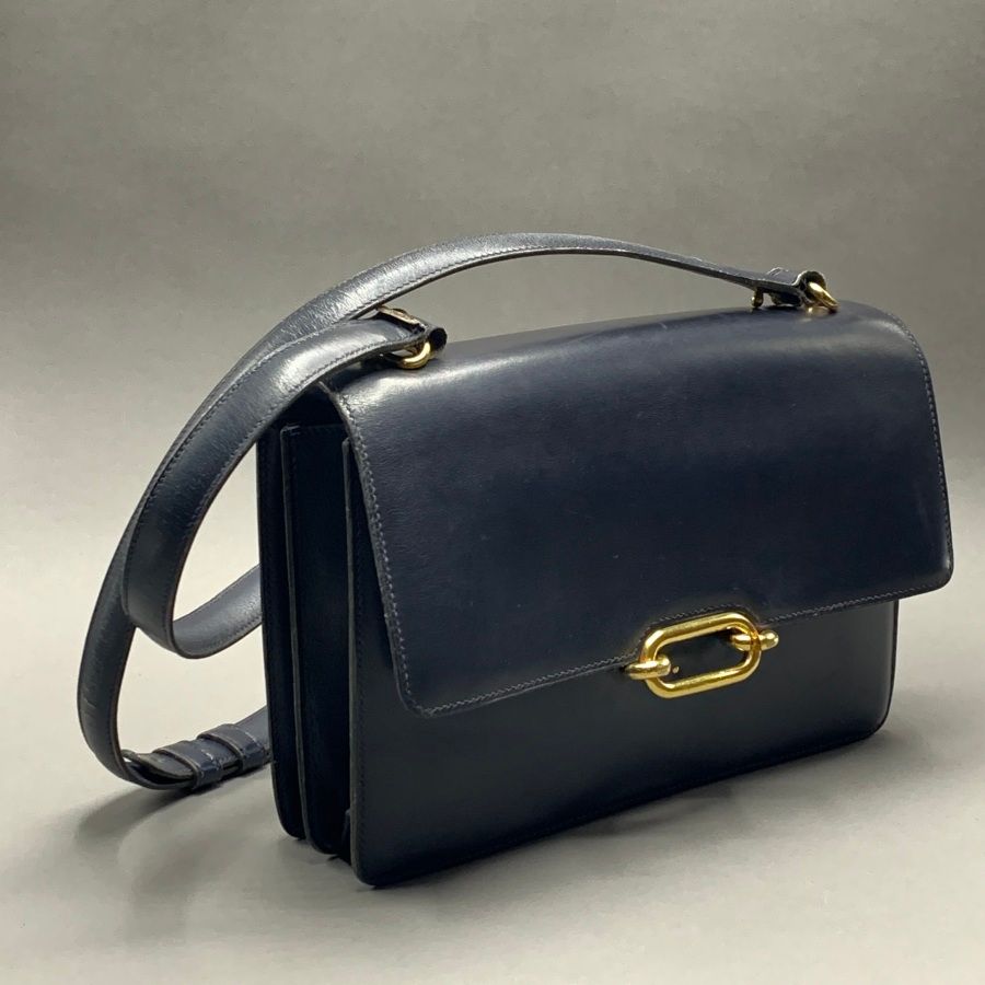 Null 
HERMES Paris

Navy blue box bag, gold plated clasp on flap and fasteners, &hellip;
