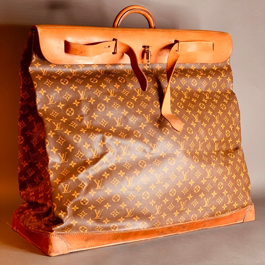 Null Louis VUITTON

Steamer" bag in natural leather and monogram canvas, flap cl&hellip;
