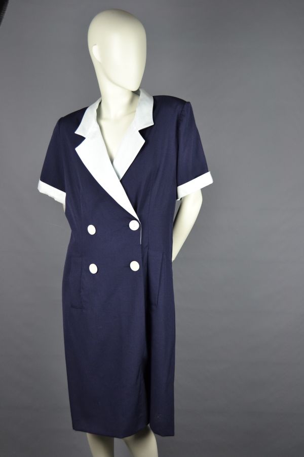 Null Variante de Yves SAINT LAURENT

Vestido de lana azul marino de doble botona&hellip;