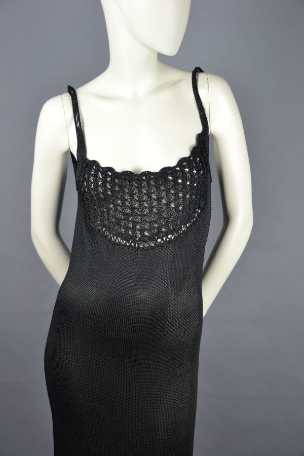 Null *LACROIX

Long dress in black viscose, thin straps, round openwork neckline&hellip;