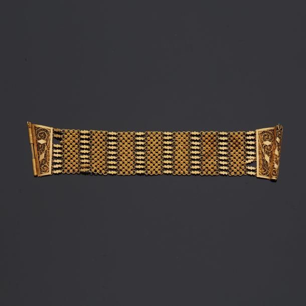 Null Large bracelet souple en or jaune 18 k (750 millièmes) à décor de motifs al&hellip;