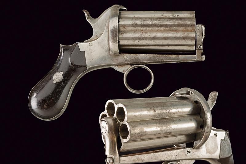 A pin fire pepperbox revolver 日期：1870年 出处：欧洲，开槽，六室汽缸/枪管组，9毫米口径，带开杆系统。光滑的铁架，环形扳机。&hellip;