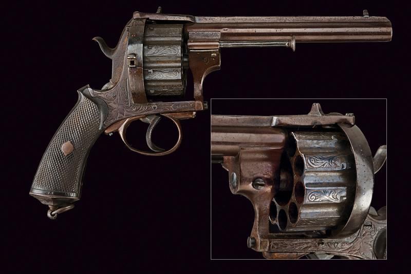 A rare ten-shot pin fire revolver 年代：约1870年出处：比利时，圆形，有膛线，11毫米口径的枪管，有高肋和前视镜；刻有花纹图&hellip;