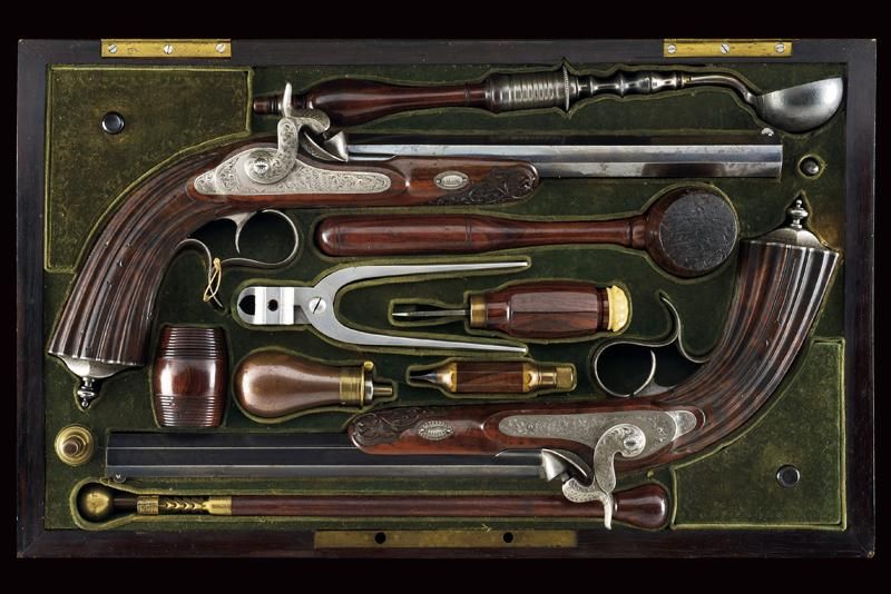 A pair of fine cased percussion pistols marked 'DDB' datazione: Metà del XIX sec&hellip;