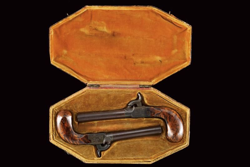 A pair of percussion pockets pistols in an elegant leather case 日期：19世纪中期19世纪中期 &hellip;
