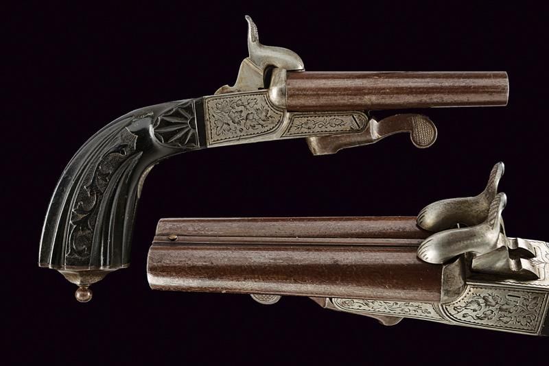 A fine double barrelled pin fire pistol by P. Berjat datation : vers 1870 proven&hellip;