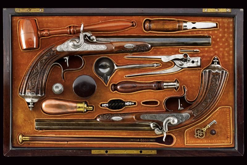 A fine pair of cased percussion pistols by Jaquet datazione: Metà del XIX secolo&hellip;