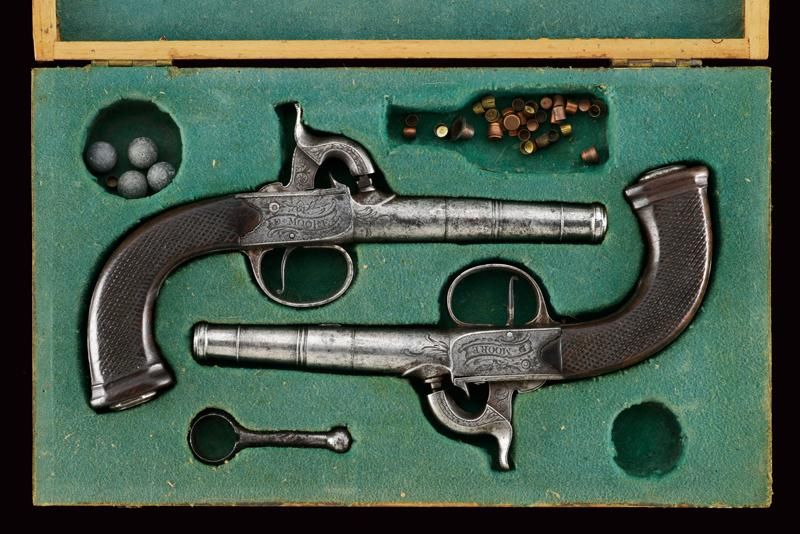 A pair of cased percussion pistols by D. Moore 日期：19世纪中期19世纪中期 出处：伦敦伦敦，圆形，滑膛，岔开，&hellip;