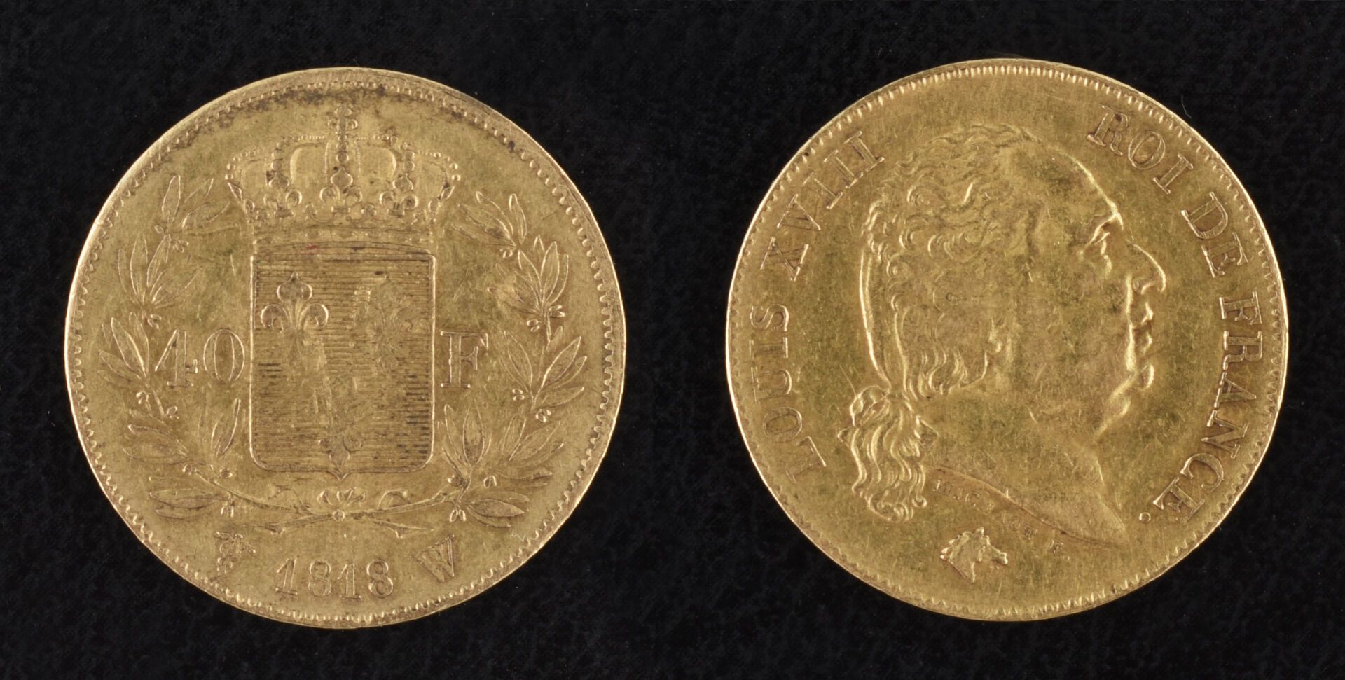 Null 法国 - 王权复辟（1814-1830 年）
40 法郎或路易十八半身像硬币，1818 年，里尔。
很好到非常好。