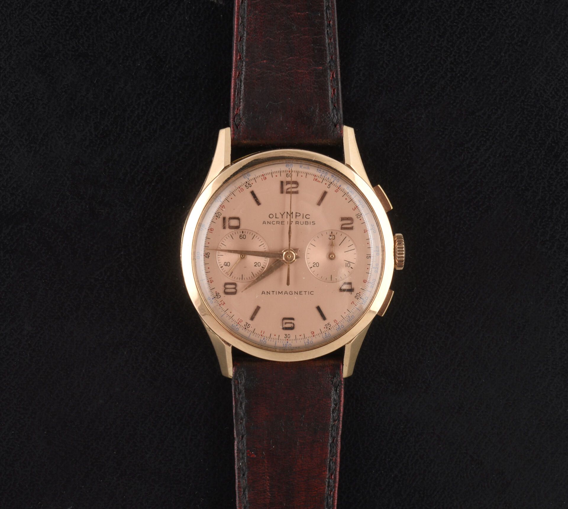 Null Herren-Chronographen-Armbanduhr aus Roségold OLYMPIC in runder Form. Roséfa&hellip;