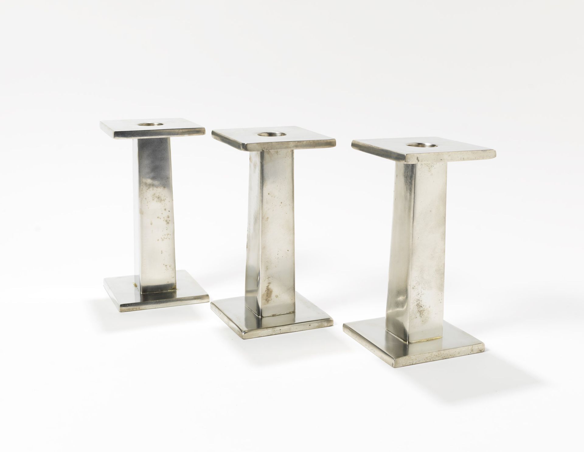 ETTORE SOTTSASS (1917-2007) Cadmo

Three candle holders
Pewter

Metallia Series
&hellip;