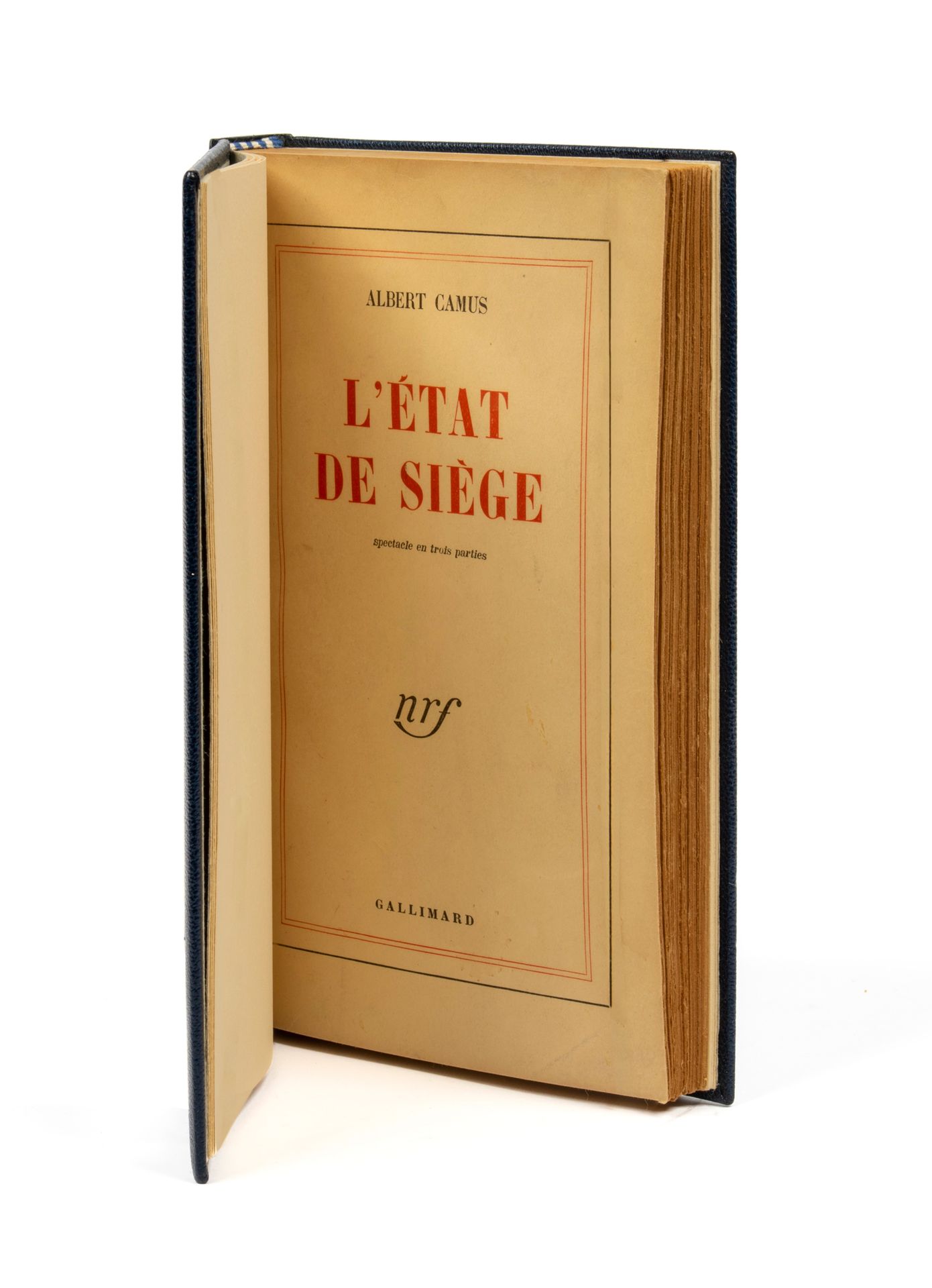 CAMUS Albert. L'état de siège. Gallimard, 1948. In-12, chagrin bleu nuit, à déco&hellip;