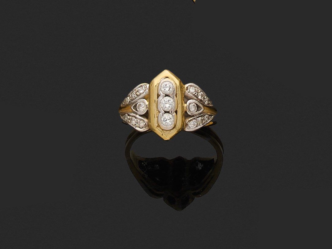 Null Ring 

in 750 thousandths yellow gold, the center set with round brilliant-&hellip;