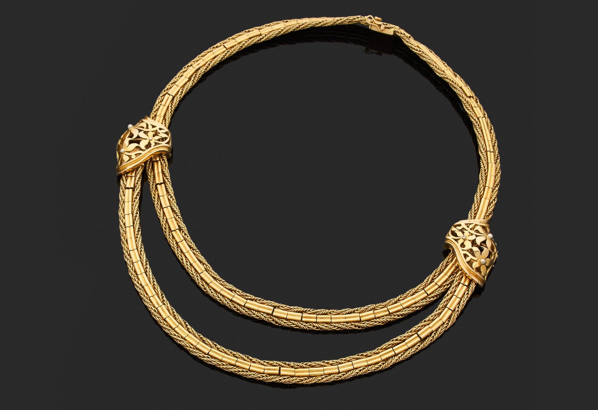 Null Halsband 

aus 750er Gelbgold, bestehend aus Gliedern mit geometrischem Dek&hellip;