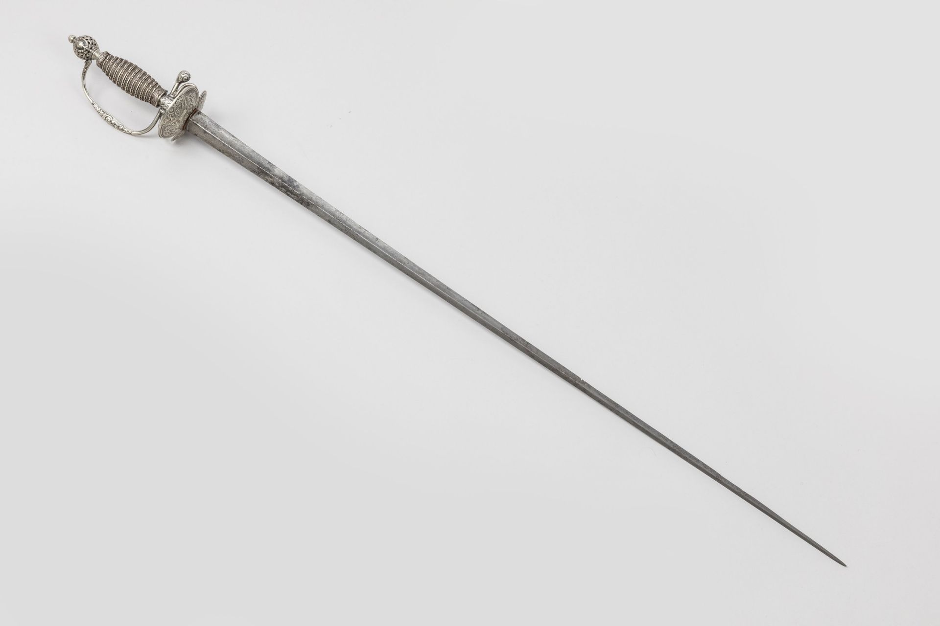 Null Officer's sword 

Chased and hallmarked silver mounting. Filigree spindle. &hellip;